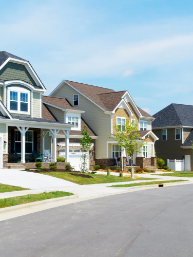 A neighborhood street filled with houses.